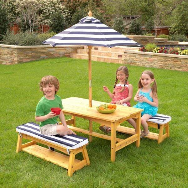 Order KidKraft outdoor table bench set with cushions umbrella navy white stripes Now! Jomla.ae