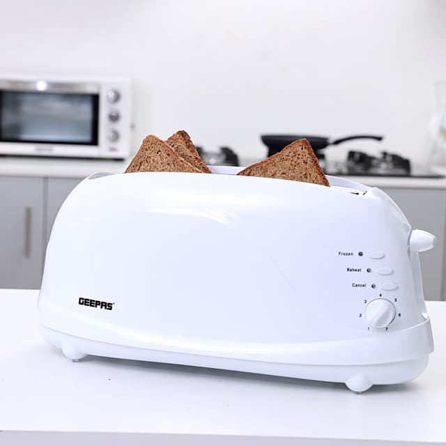 Geepas 1100W 4 Slices Bread Toaster - Crumb Tray, Cord Storage, 7 Settings with Cancel, Defrost & Reheat Function -Removable crumb tray -2 years’ warranty