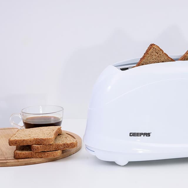 Geepas 1100W 4 Slices Bread Toaster - Crumb Tray, Cord Storage, 7 Settings with Cancel, Defrost & Reheat Function -Removable crumb tray -2 years’ warranty