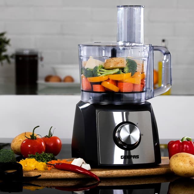 Geepas GMC42015UK 1200W Compact Food Processor - Multifunctional Electric Chopper with Shredder & Grater Attachments - 1.2L Bowl Capacity - Stainless Steel & Dough Blades Included - 2 Years Warranty