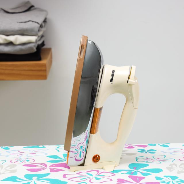 Geepas Electric Dry Iron, Golden Ceramic Soleplate, GDI2752 | Heavy Weight | Adjustable Temperature | Pilot Indicator Lamp | Overheat Protection | Swivel Cord - SW1hZ2U6NDI4NjU2