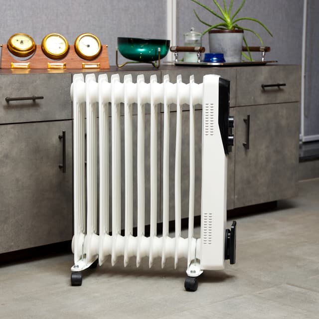 مدفأة كهربائية (شوفاج متنقل) مع 11 شفرة Olsenmark Oil Filled Radiator 11 Fins Radiator - 188465