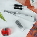 مجموعة تصفيف الشعر 4في1 750W لون أبيض 4In1 Hot Air Styler, Brush, Volumizer, Curler - Hot Air Brush