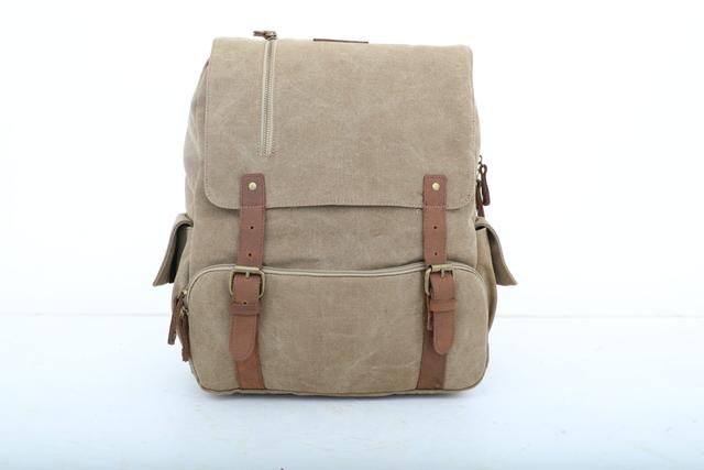 شنطة ظهر جلد لون بيج قياس 15 بوصة Leather Canvas Backpack - Canvy - SW1hZ2U6NDM5NDE1