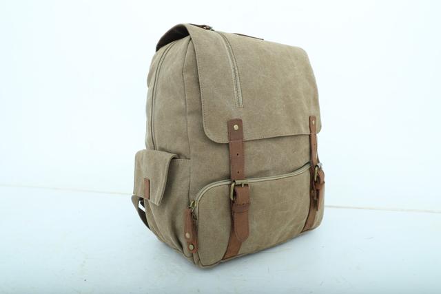 شنطة ظهر جلد لون بيج قياس 15 بوصة Leather Canvas Backpack - Canvy - SW1hZ2U6NDM5NDE5