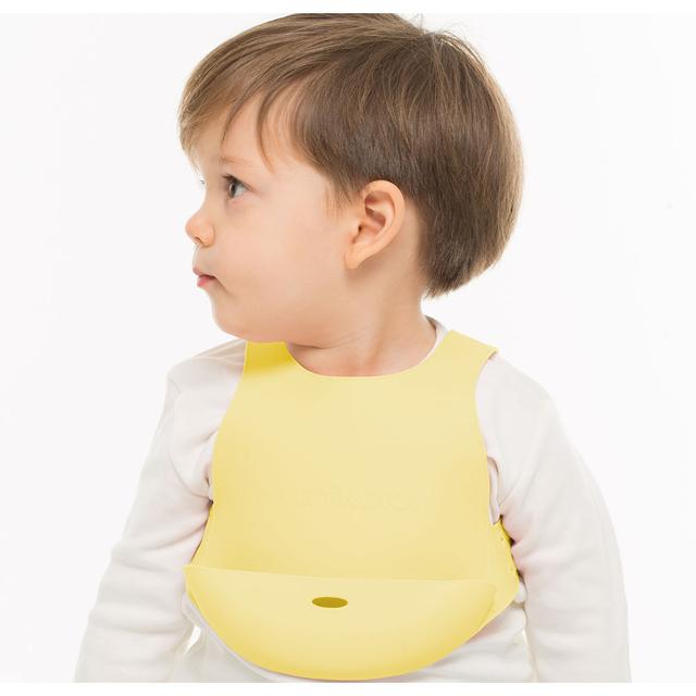 مريلة اطفال (سيليكون) - أصفر فاتح Minikoioi Silicone Flexi Bib - SW1hZ2U6NjUyOTMw