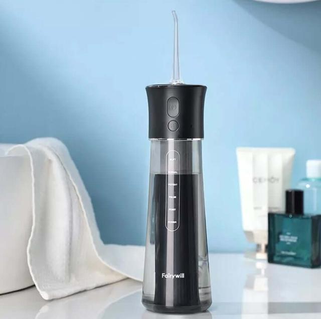 جهاز خيط الاسنان المائي شفاف فيري ويل  300 مل Fairywill F30 Water Flosser - SW1hZ2U6MTM1ODQ3OA==