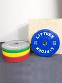 طارات اوزان حديد قرصية 15 كجم بطبقة مطاطية باللون الاصفر من ليفتديكس Liftdex - Colored Rubber Plates Weight 15 Kg