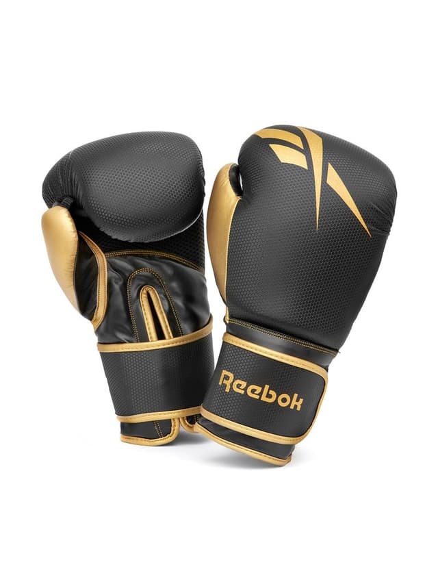 قفازات ملاكمة 12 أونصة مع لفافات يد 2.5 متر أسود وذهبي ريبوك فيتنيس Reebok Fitness Boxing Gloves + Wraps Set Color Gold/BlackSize 12 Oz - SW1hZ2U6MTU0NTgxOQ==