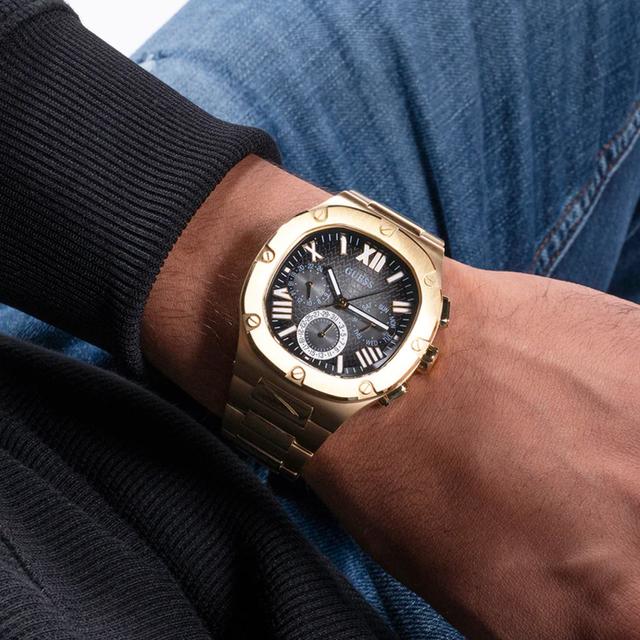 ساعات جيس رجالي Gw0572g2 قياس 42 ملم معدن ذهبي Guess Men's Gold Tone Multi-Function Stainless Steel Watch Gw0572g2 - SW1hZ2U6MTgyODA4Mw==