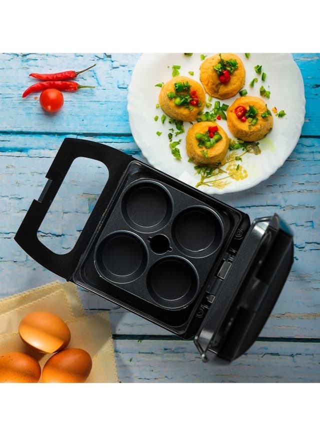 جهاز سلق البيض 600 واط 4 قطع غير لاصقة أسود جيباس Geepas Non-Stick 4 Egg Bite Maker Cool Touch Handles & Skid - 452481
