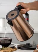 Geepas Three Layer Stainless Steel Electric Kettle 360-Degrees Rotation, Boil Dry Protection And Automatic Cut-Off Perfect For Boiling Water, Milk, Tea 1850-2200 W, Seamless Welding 2 Years Warranty, Metallic Brown Color 1.7 L 2200 W Gold/Black - 452154