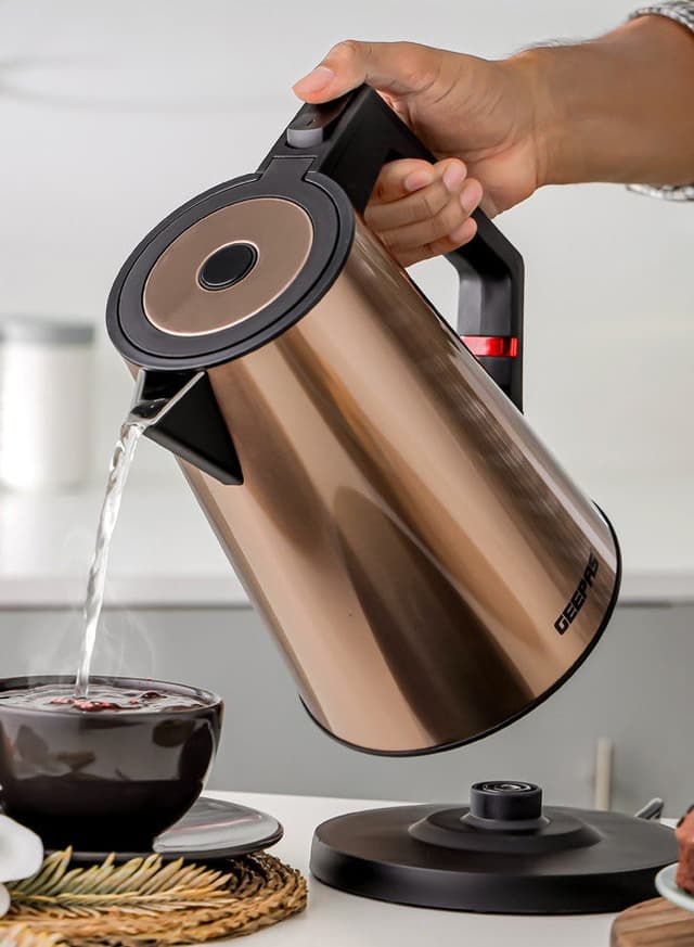 Geepas Three Layer Stainless Steel Electric Kettle 360-Degrees Rotation, Boil Dry Protection And Automatic Cut-Off Perfect For Boiling Water, Milk, Tea 1850-2200 W, Seamless Welding 2 Years Warranty, Metallic Brown Color 1.7 L 2200 W Gold/Black - 452154