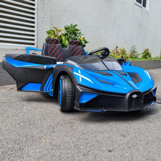 سيارة اطفال كبيرة درفت كهربائية بوجاتي بوليد 12 فولت مع ريموت Kids Ride On Bugatti Bolide Electric Car - SW1hZ2U6MzA3MjkyOA==