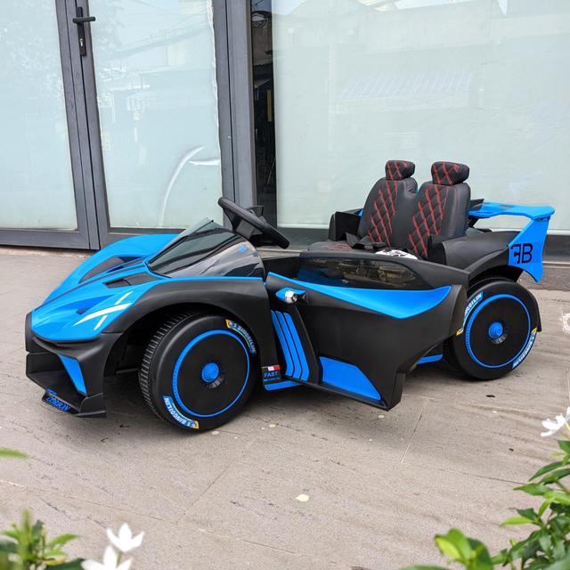 سيارة اطفال كبيرة درفت كهربائية بوجاتي بوليد 12 فولت مع ريموت Kids Ride On Bugatti Bolide Electric Car - SW1hZ2U6MzA3MjkzMg==