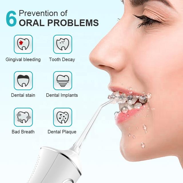 جهاز خيط الاسنان المائي محمول 2000 مللي أمبير 300 مللي Portable Oral Irrigator Water Flosser