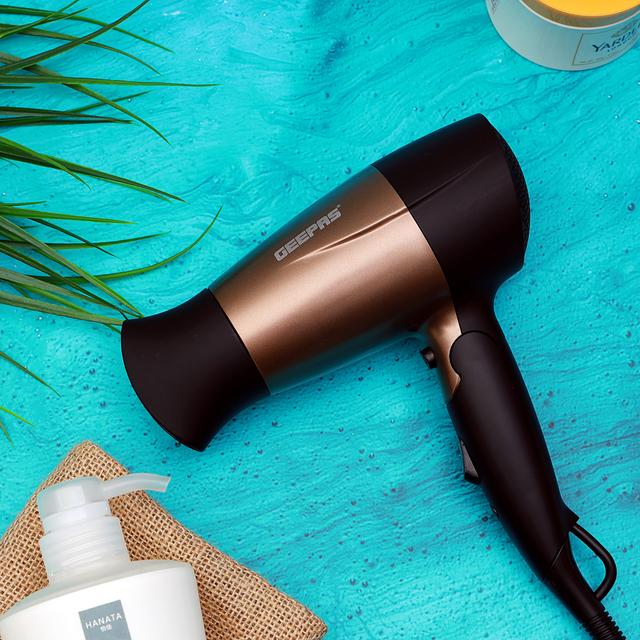 Geepas 1600w Mini Hair Dryer With Foldable Handle 2-Speed & 2 Temperature Settings Cool Shot Function -Ideal For All Types Of Hairs 2 Years Warranty - SW1hZ2U6MTM4NzM5