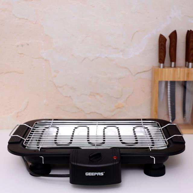 Geepas 2000W Electric Barbecue Grill - Table Grill, Auto-Thermostat Control with Overheat Protection - Space Saving, Detachable Heating Element - Ideal for BBQ Perfect for both Indoor & Outdoor cooking - 2 Years Warranty - SW1hZ2U6MTM1MjI2