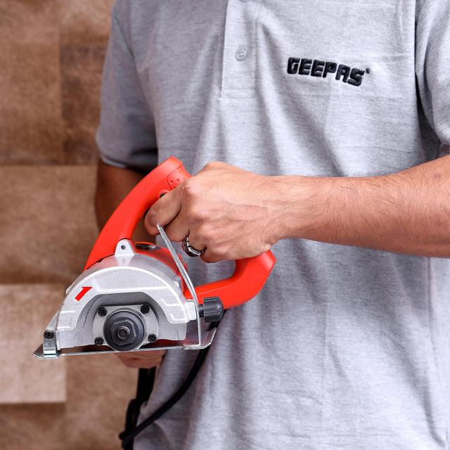 Geepas Tile Cutter 110mm - Marble Cutter Multi-Purpose Cutter 1300W, 14000Rpm Aluminium Alloy Bearing Base - Suitable for Wet & Dry Cutting - Ideal for Tile, Marble, Wood, Soft Metal - 1 Year Warranty - SW1hZ2U6MTQ1MDU2