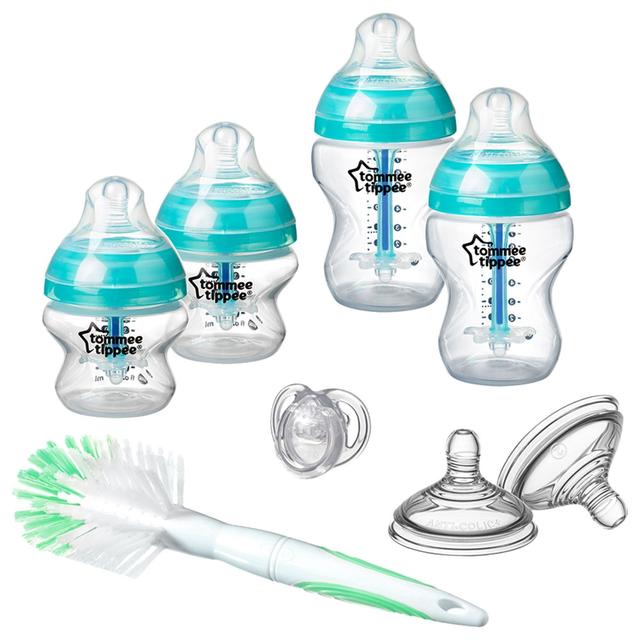 رضاعة اطفال حديثي الولادة حزمة 4في1  مع فرشاة ولهاية Tommee Tippee Newborn Baby Bottle Starter Kit - SW1hZ2U6NjY3OTg2