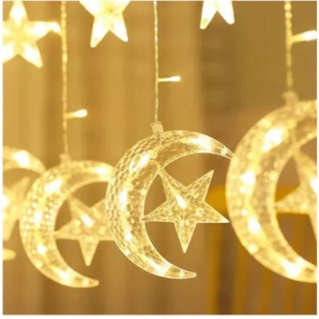 زينة رمضان للبيت هلال رمضان مع إضاءة 5 متر Toby's Ramadan Crescent Moon Star Curtain LED Fairy Lights - SW1hZ2U6OTg2MzUw